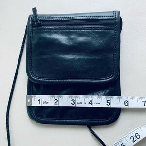 Brookstone genuine black leather travel organizer/passport holder shoulder bag